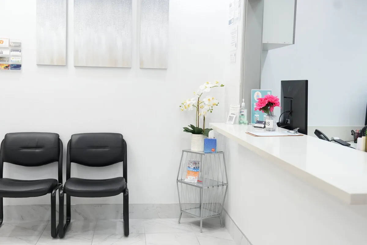 The reception counter seen from the waiting area